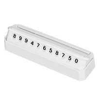 Табличка «Tempark» с номером телефона для временной парковки