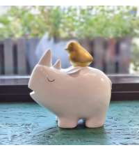 Статуэтка носорог и пеночка