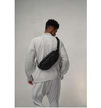 Наплечная сумка KORIN FlipSling 32х16х10 см, черная